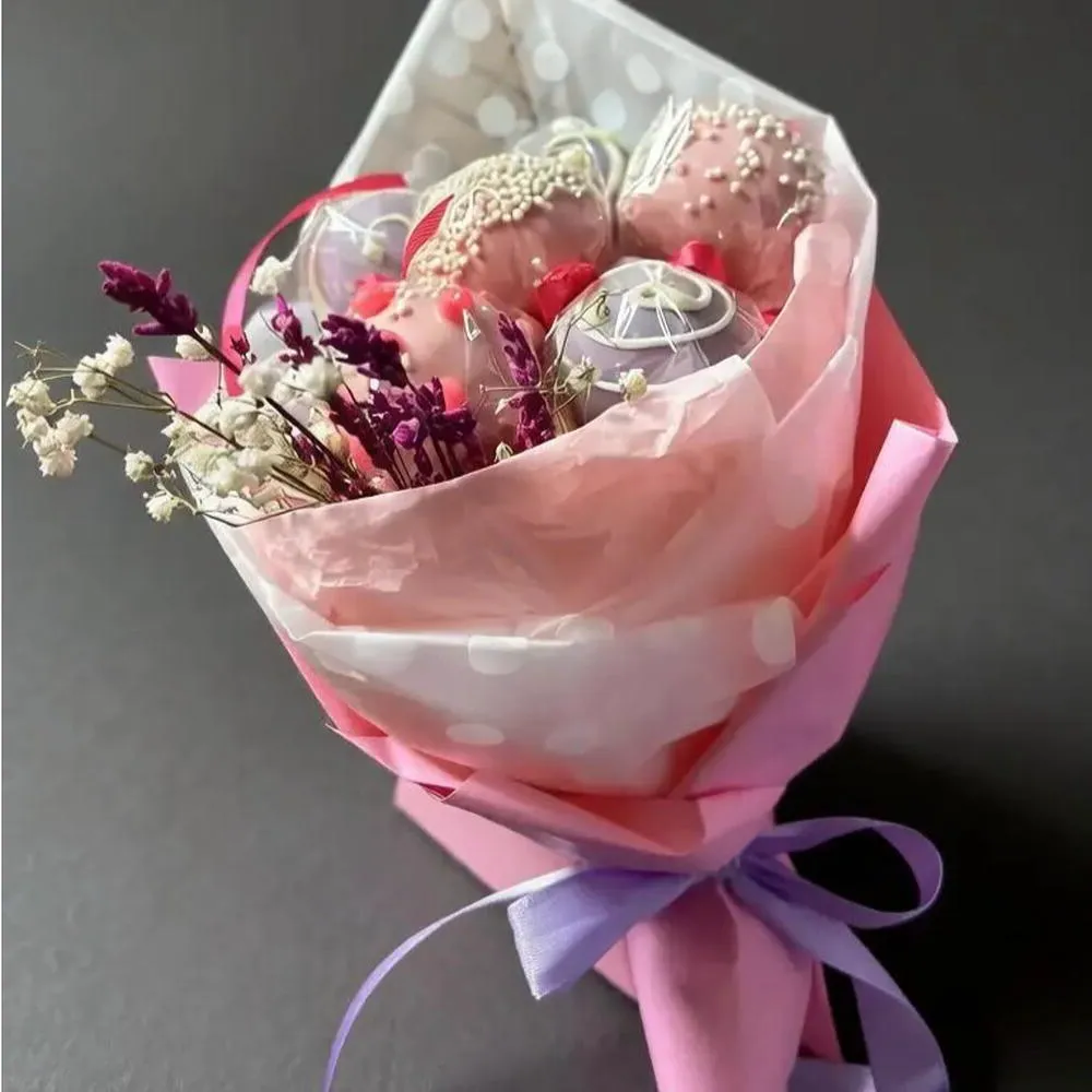Pink and lavender cake pop gift bouquet tied with ribbon - Popcakes Ottawa