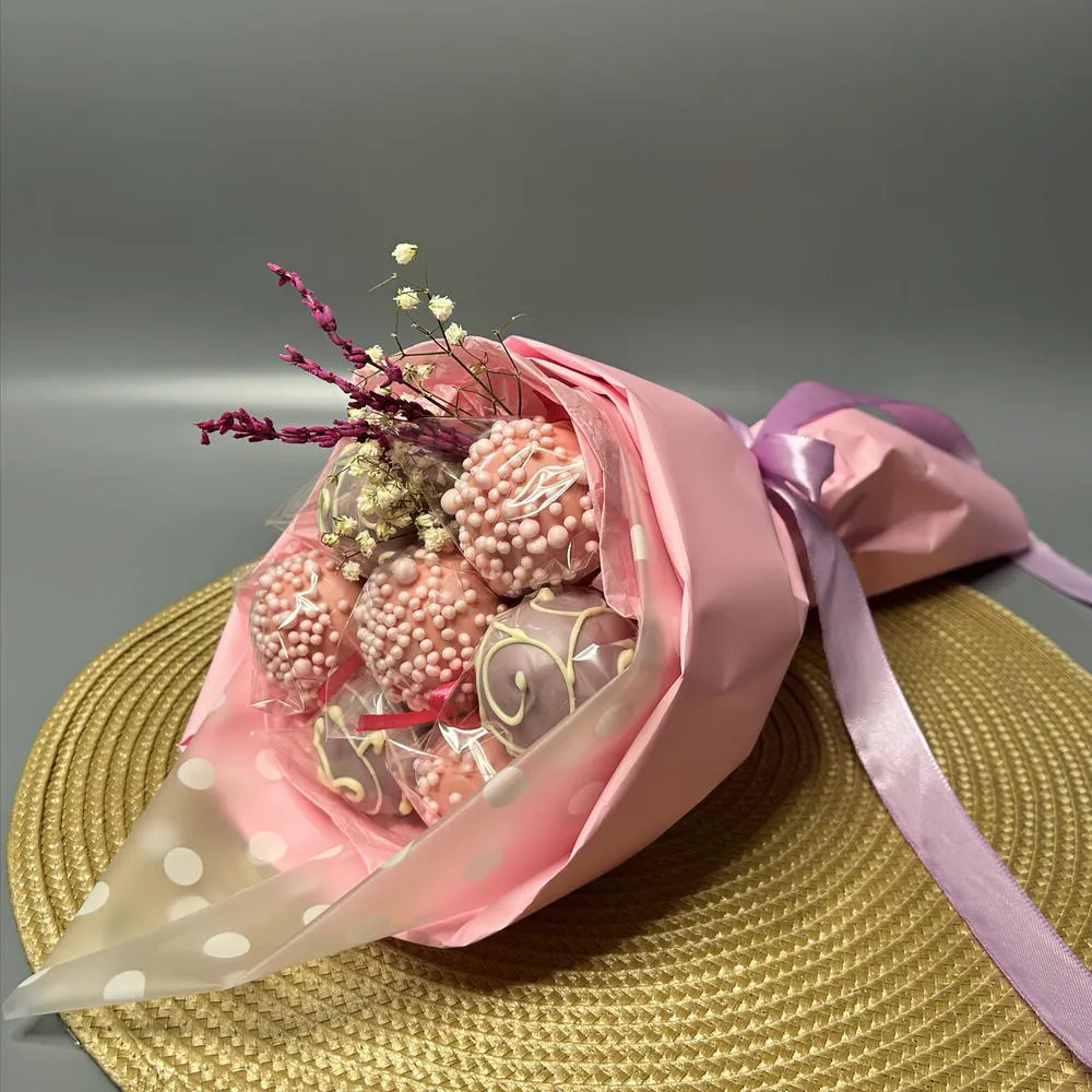 Wrapped cake pop gift bouquet with decorative flowers - Popcakes Ottawa