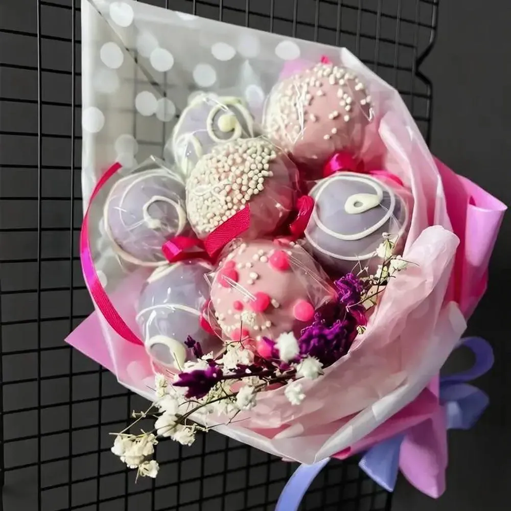 Pink and lavender cake pop bouquet in gift wrapping - Popcakes Ottawa