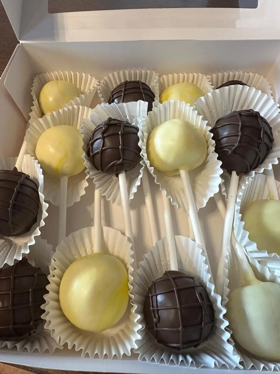 Dozen chocolate and yellow cake pops in a gift box - Popcakes Ottawa
