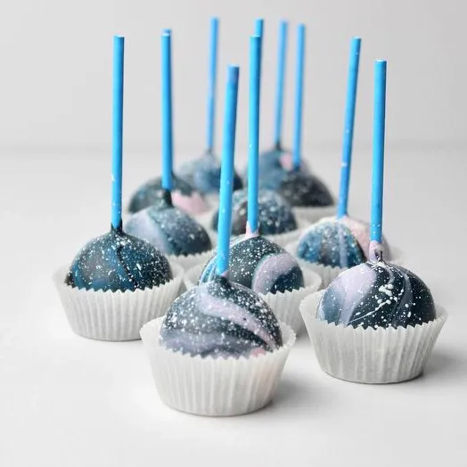 Blue and white galaxy cake pops with blue sticks - Popcakes Ottawa