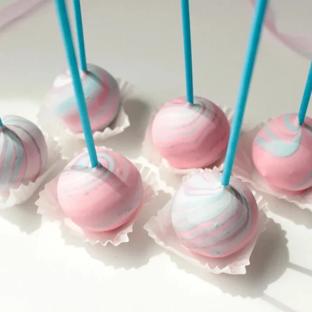 Pink and pale blue swirl cake pops for celebration colour inspiration - Popcakes Ottawa