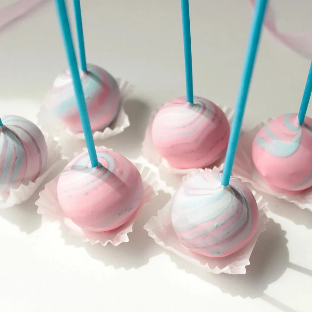 Pink and pale blue swirl cake pops for celebration colour inspiration - Popcakes Ottawa