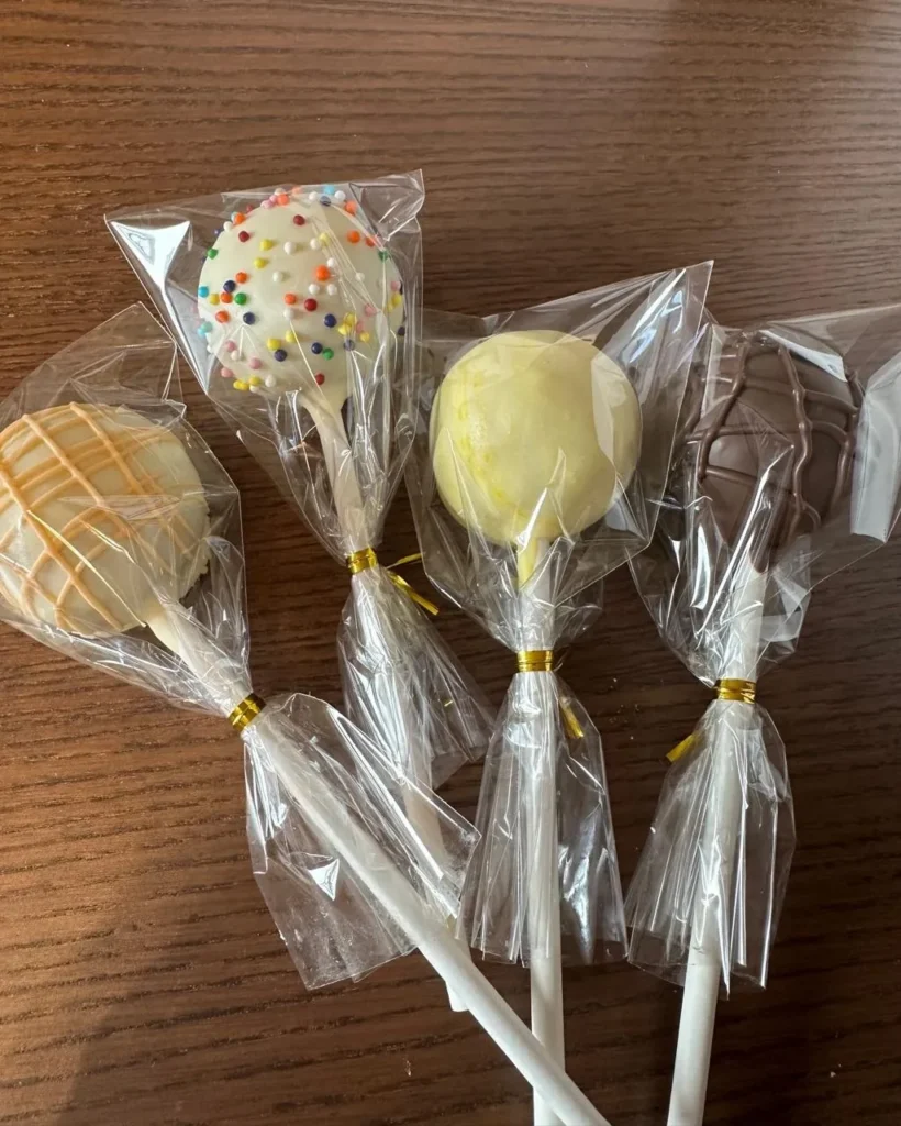 Individually wrapped cake pops tied with gold twist ties - Popcakes Ottawa