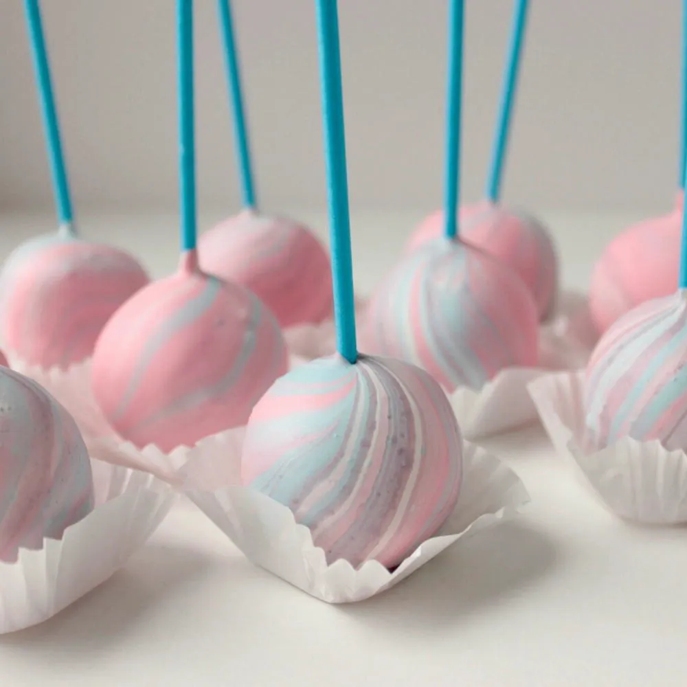 Row of pink and pale blue swirl cake pops - Popcakes Ottawa