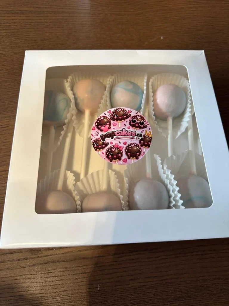 Pastel marbled cake pops in a gift box with Popcakes sticker - Popcakes Ottawa